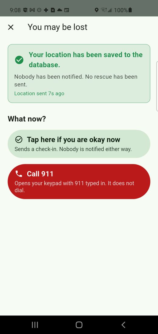 The confirmation after flagging as possibly lost: an option to stand down, and a red Call 911 button.